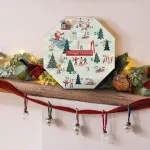 Calendario dell'Avvento di Natale a forma di ghirlanda